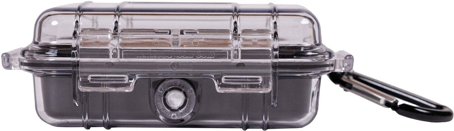 The 1010 PELI Micro™ Case is a small, transparent, crushproof hard plastic case with a latch and black carabiner, providing durable protection for your essentials.