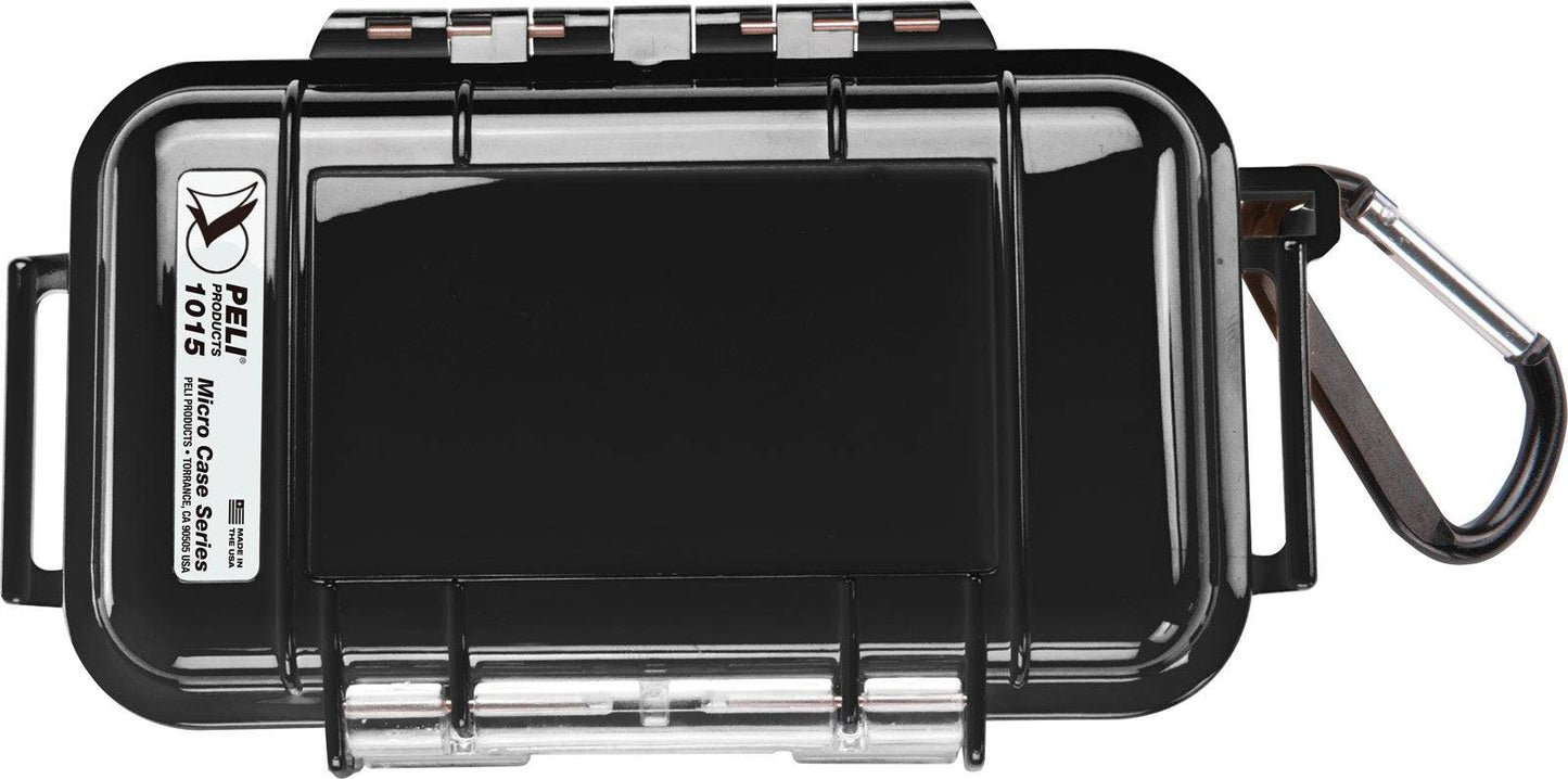 A black 1015 PELI Micro™ Case with a transparent lid, a label on the left side, and a metal carabiner attached to the right.