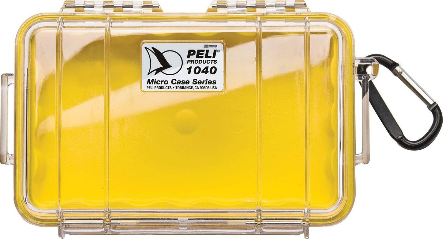 A yellow 1040 PELI Micro™ Case with a clear lid and black carabiner attached to the side, dustproof design.