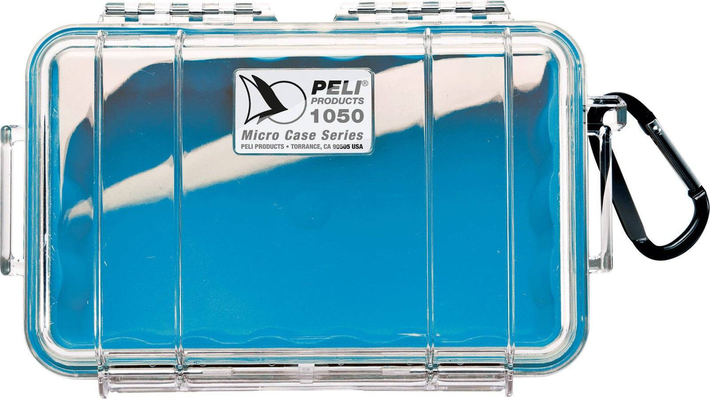 The 1050 PELI Micro™ Case features a clear plastic lid, blue base, black carabiner, and secure latches; this watertight, crushproof case is expertly designed to protect your small valuables.