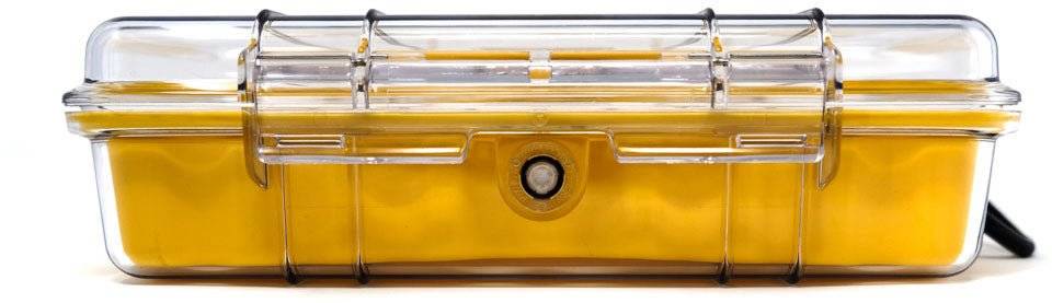 The 1060 PELI Micro™ Case is a clear plastic and yellow hard watertight case with a latch and visible hinge, shown from the front.