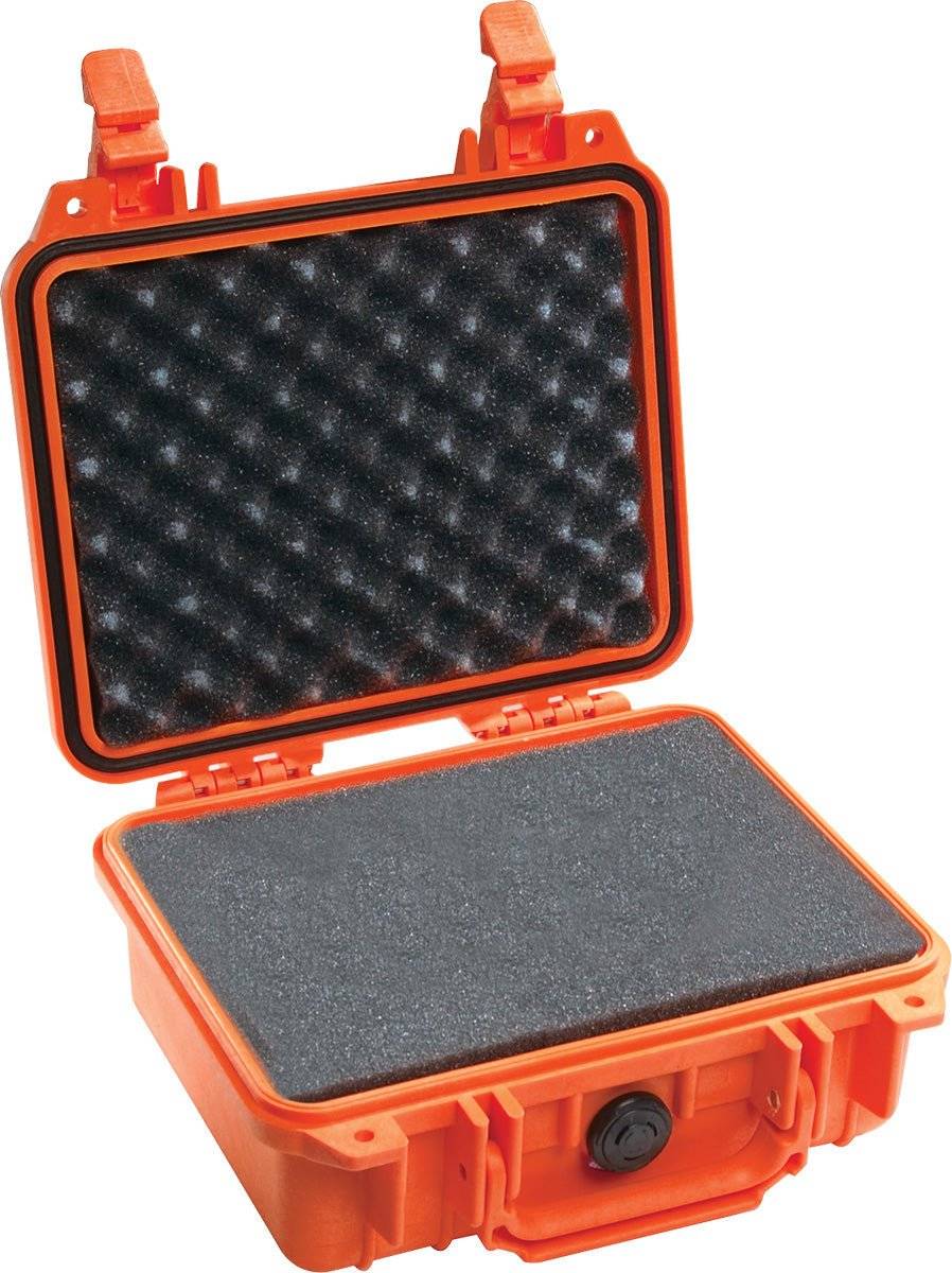 The open orange 1200 Protector Case features foam padding in the lid and base, offering robust protection for equipment during transport.