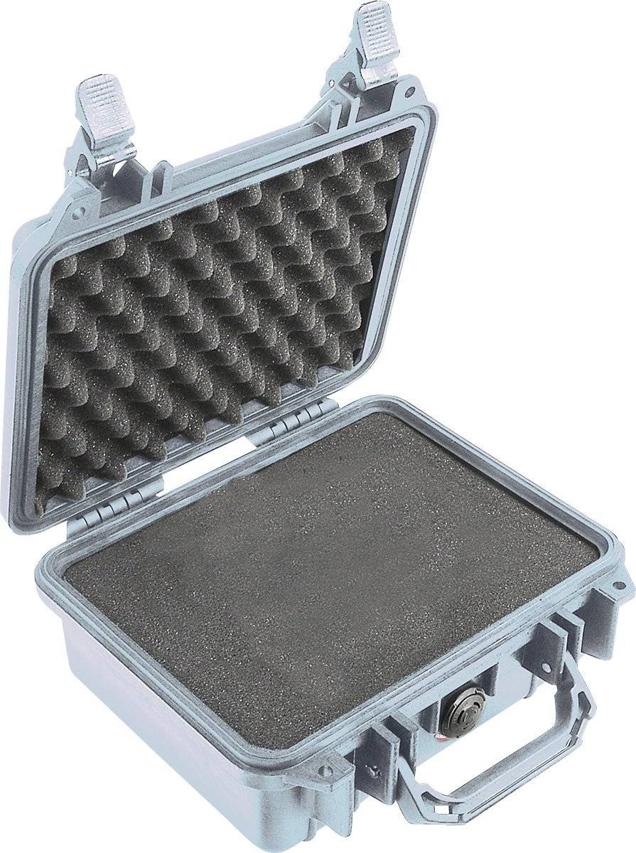 A gray PELI 1200 Protector Case made of hard plastic with an open hinged lid, foam padding on the lid and base, and a front carrying handle.