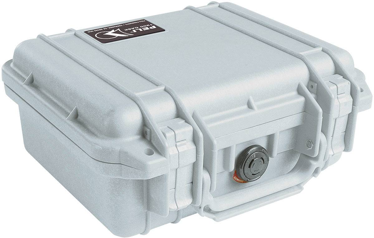 The 1200 Protector Case is a closed, light gray PELI case with reinforced edges, secure latches, and a circular front lock, providing a robust watertight storage solution.
