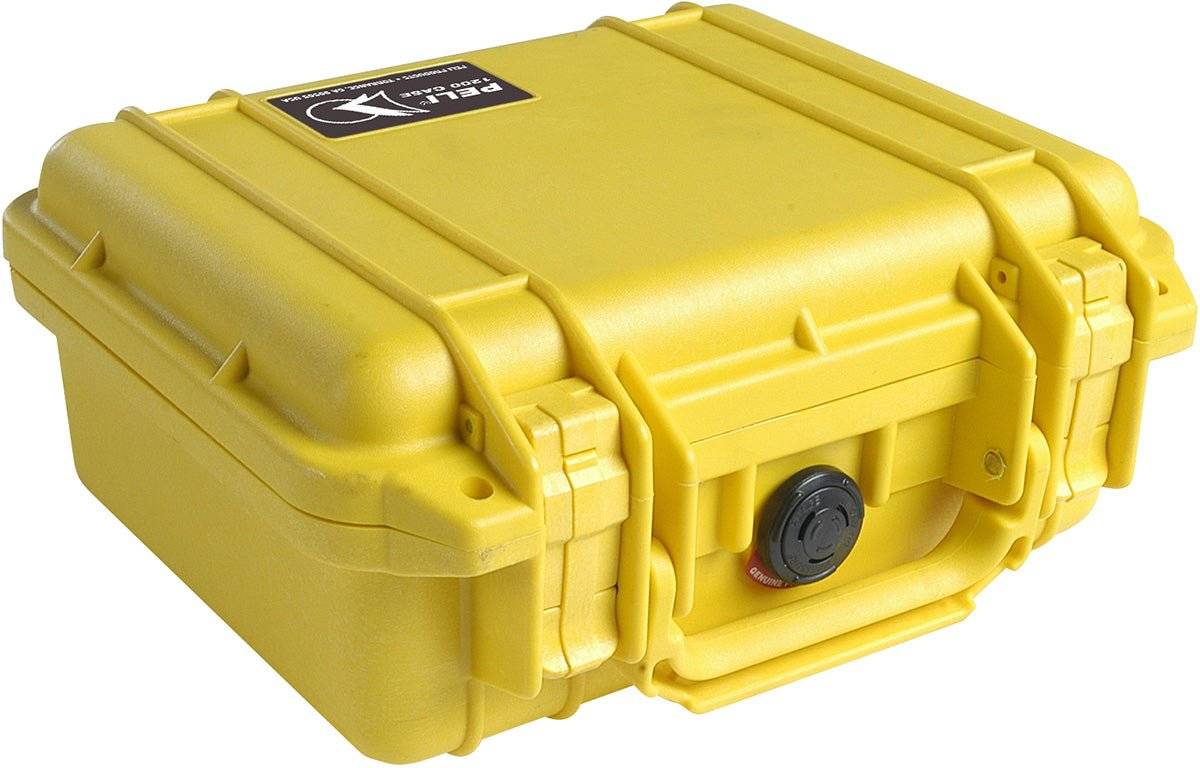 The 1200 Protector Case is a closed, hard-shell yellow PELI case with a handle, secure latches, and a black rotary lock—ideal as a reliable case to protect your valuables.