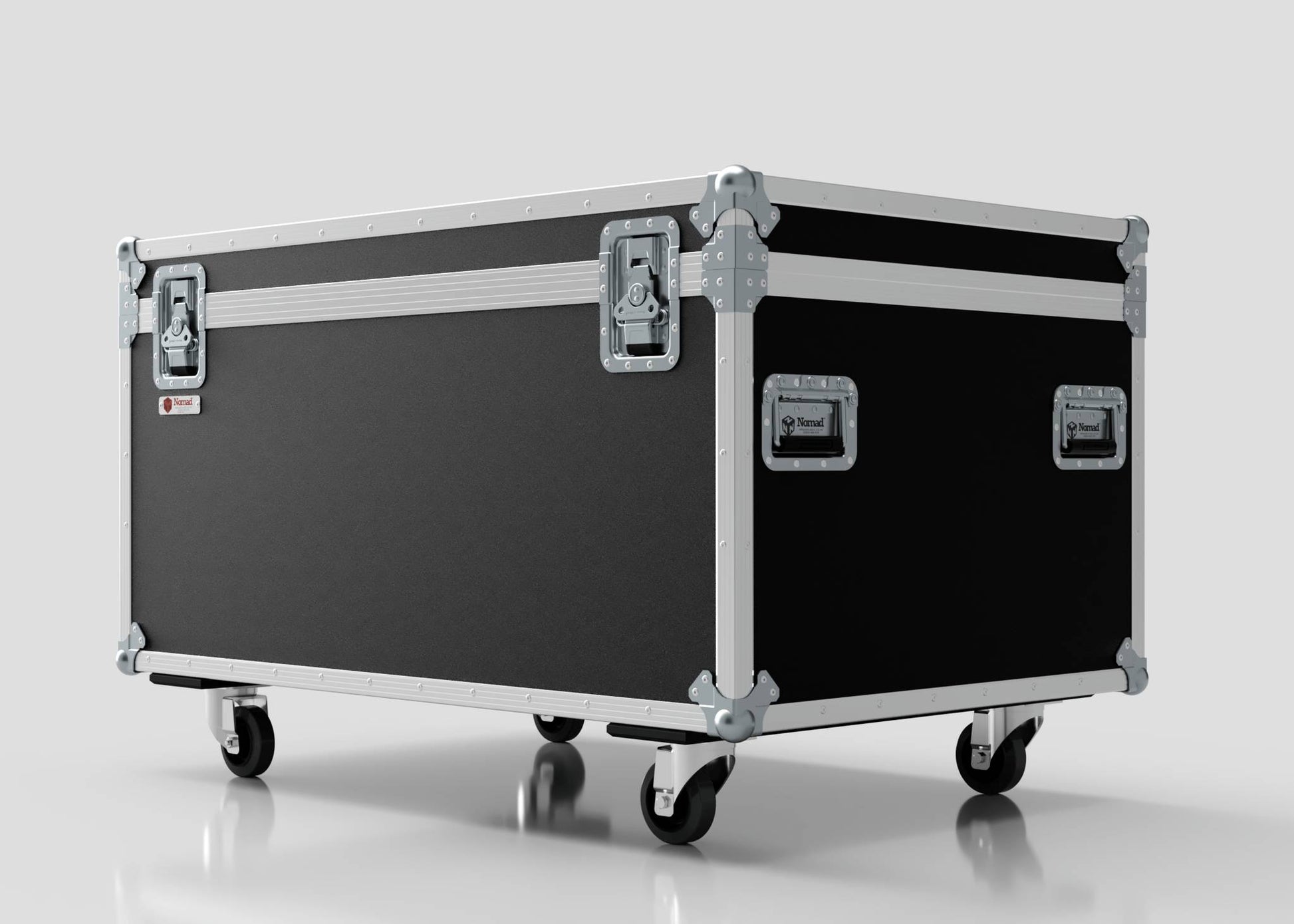 The 1200mm Jumbo Trunk Case is a large black and silver flight case with metal reinforcements, handles, and four caster wheels, measuring 1225 x 807 x 765 mm, shown against a plain white background.