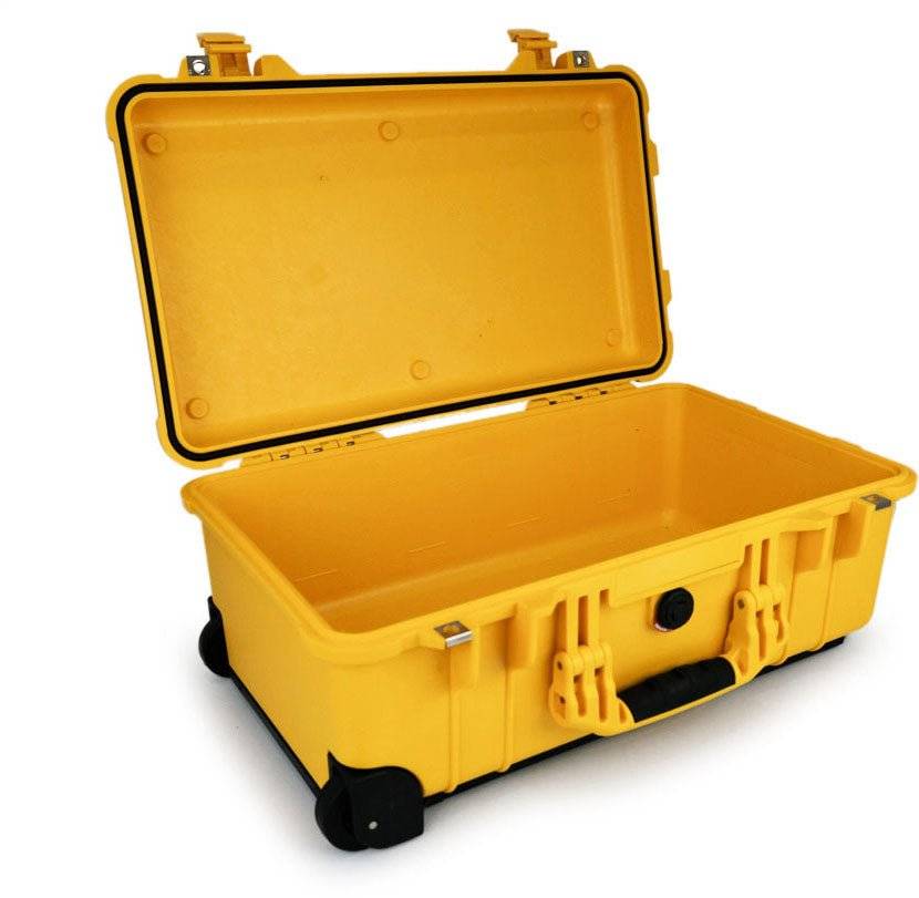 The large yellow 1510 Protector Carry-On Case features an open lid showing an empty interior, handles, and wheels—providing maximum airline carry-on size and military-grade protection.