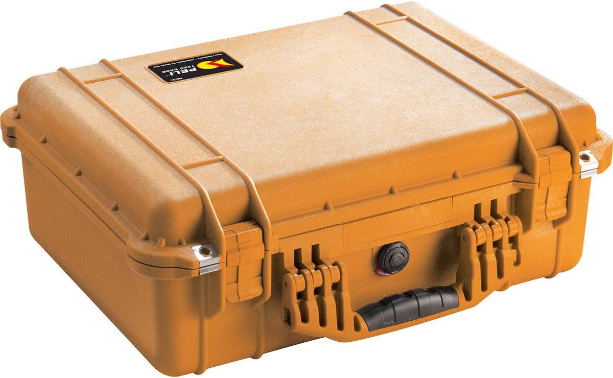The 1520EU Protector Case is a closed, hard-shell orange PELI case with double latches, black handle, and lid label, providing watertight protection for your valuables.
