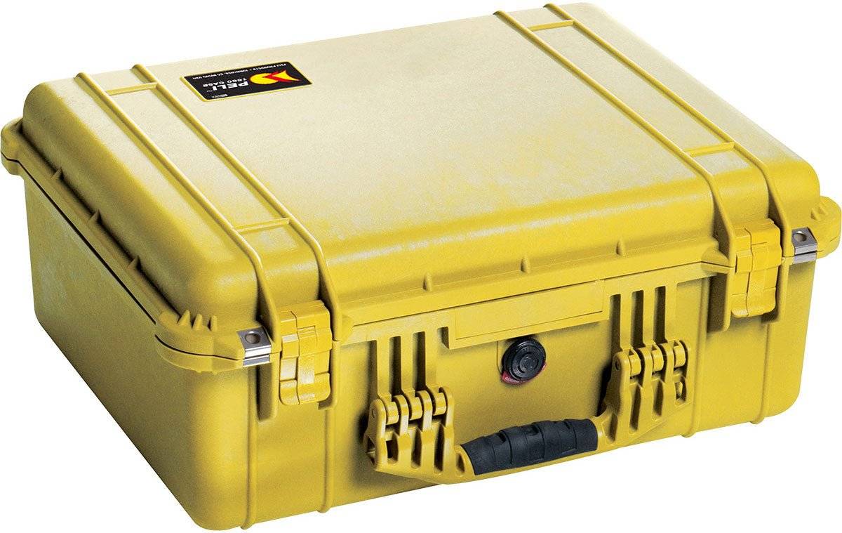 The 1550EU Protector Case is a yellow, crushproof hard plastic case from PELI featuring secure latches, a black handle, and a top left corner label.