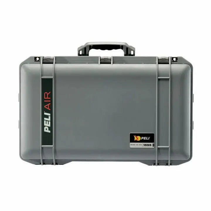 A front view of the closed, gray 1555 Air Case by PELI—a hard-shell waterproof case featuring a handle and secure latches.
