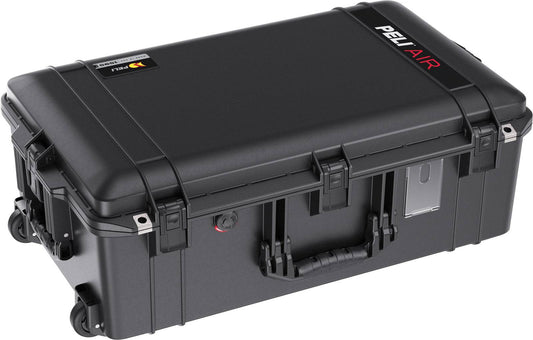 The 1595 Air Case is a black, lightweight Pelican travel case with wheels, handle, and latches, designed for durable equipment protection and transport.