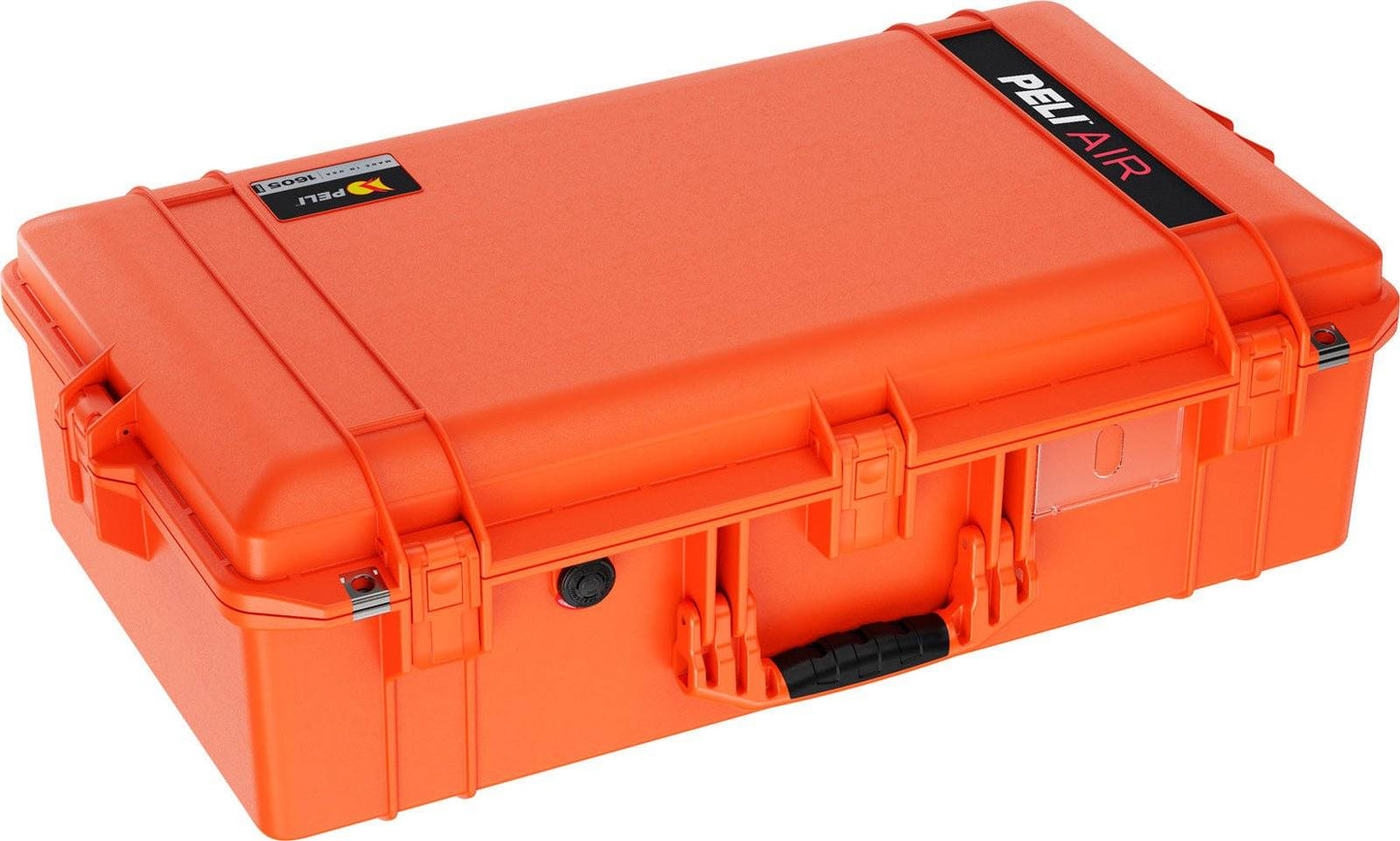 A closed, bright orange 1605 Air Case hard-shell waterproof case with black latches, a handle, and "PELI AIR" labeled on the top corner.