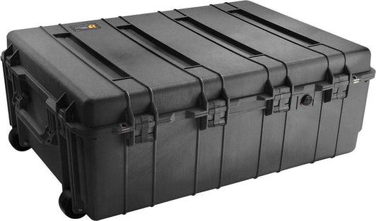 The 1730 Protector Transport Case is a large, black PELI case with wheels, handles, multiple latches, and a top-corner label—ideal for robust equipment protection during transport.