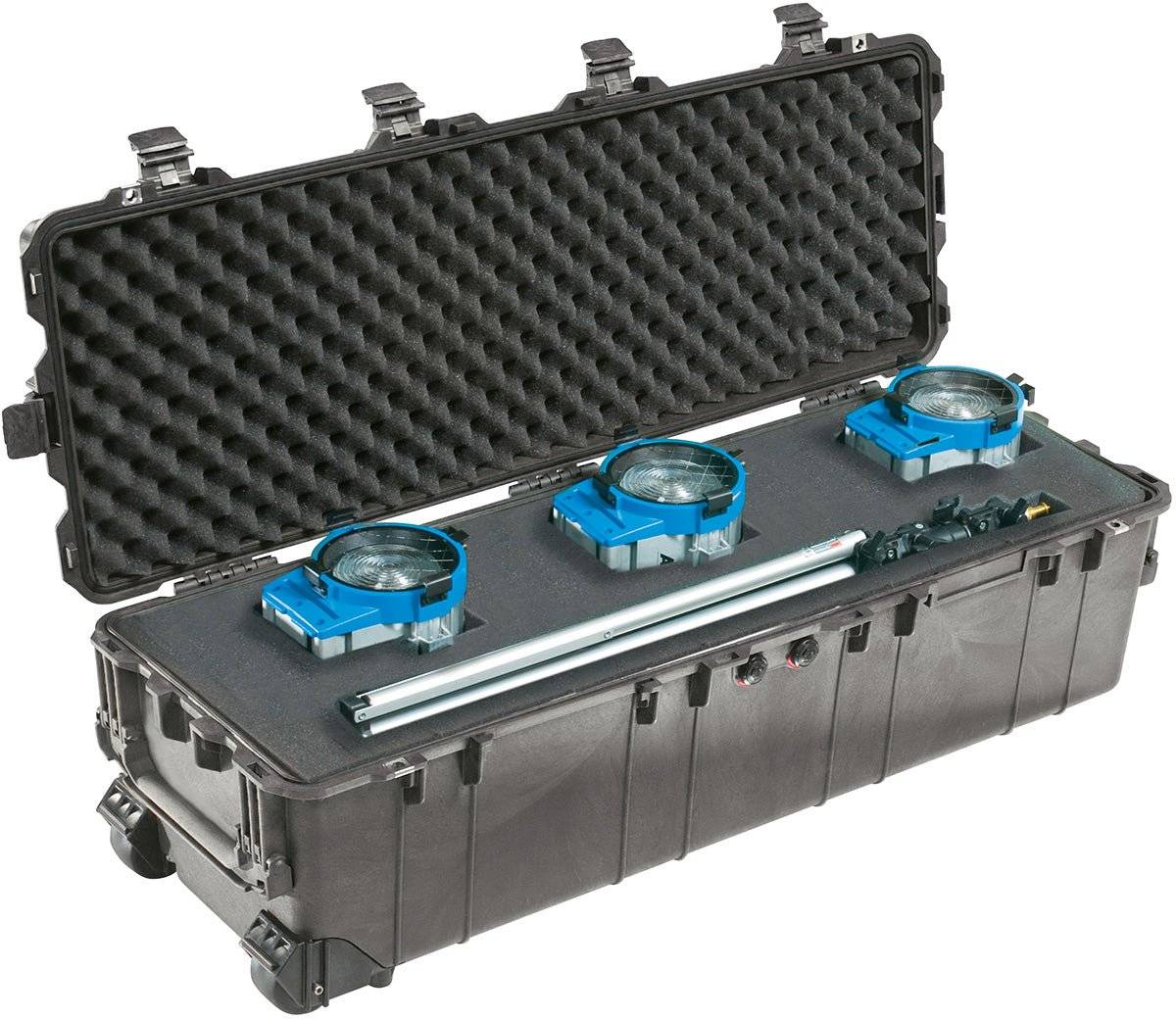 The 1740 Protector Long Case is a watertight hard-shell case with a foam interior, holding three blue circular devices, two metal rods, and extra accessories for storing long gear, shown here with the lid open.