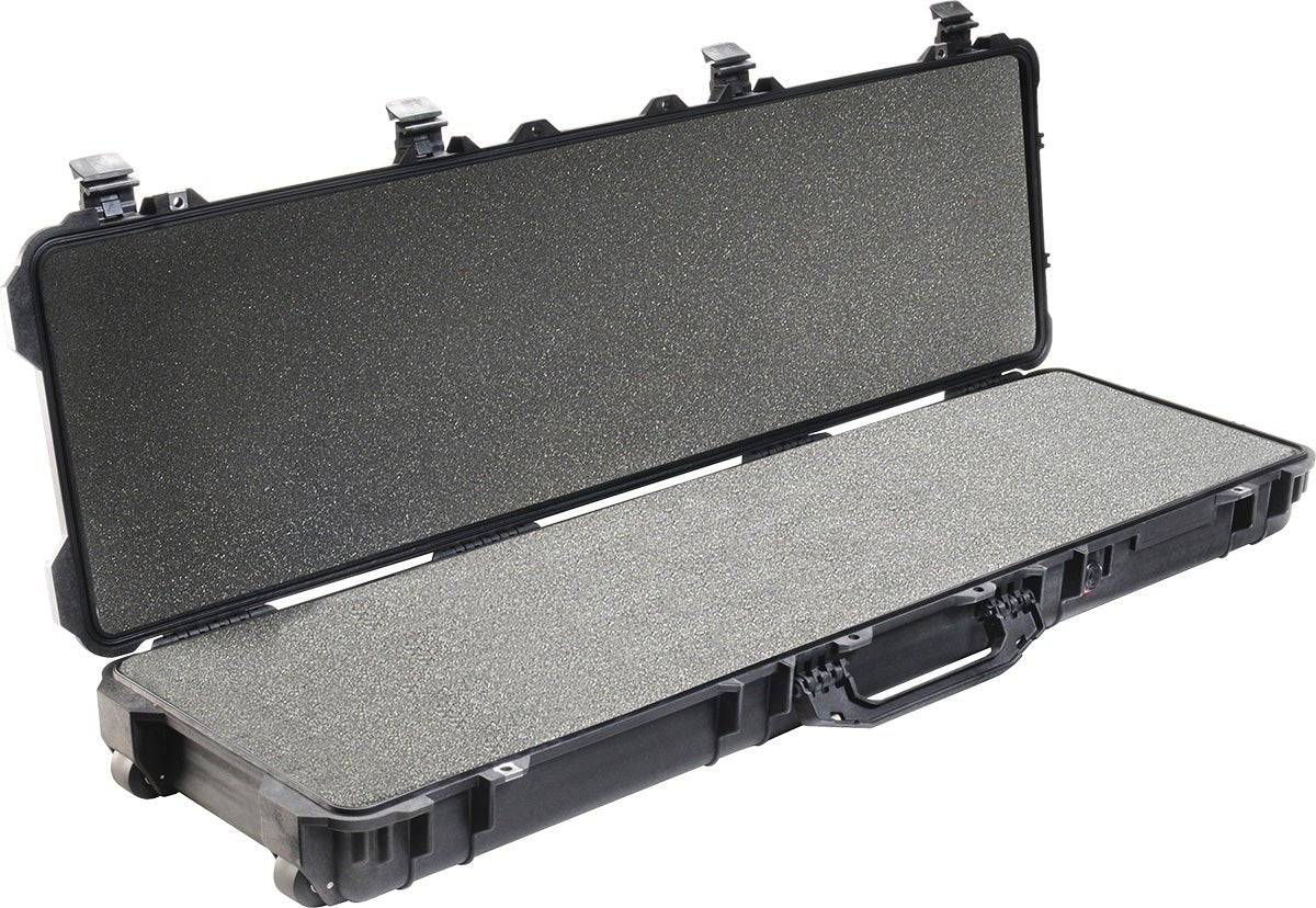A large, black 1750 Protector Long Case with a hard shell and open lid reveals foam padding inside. This watertight case is designed to keep your gear safe and secure.