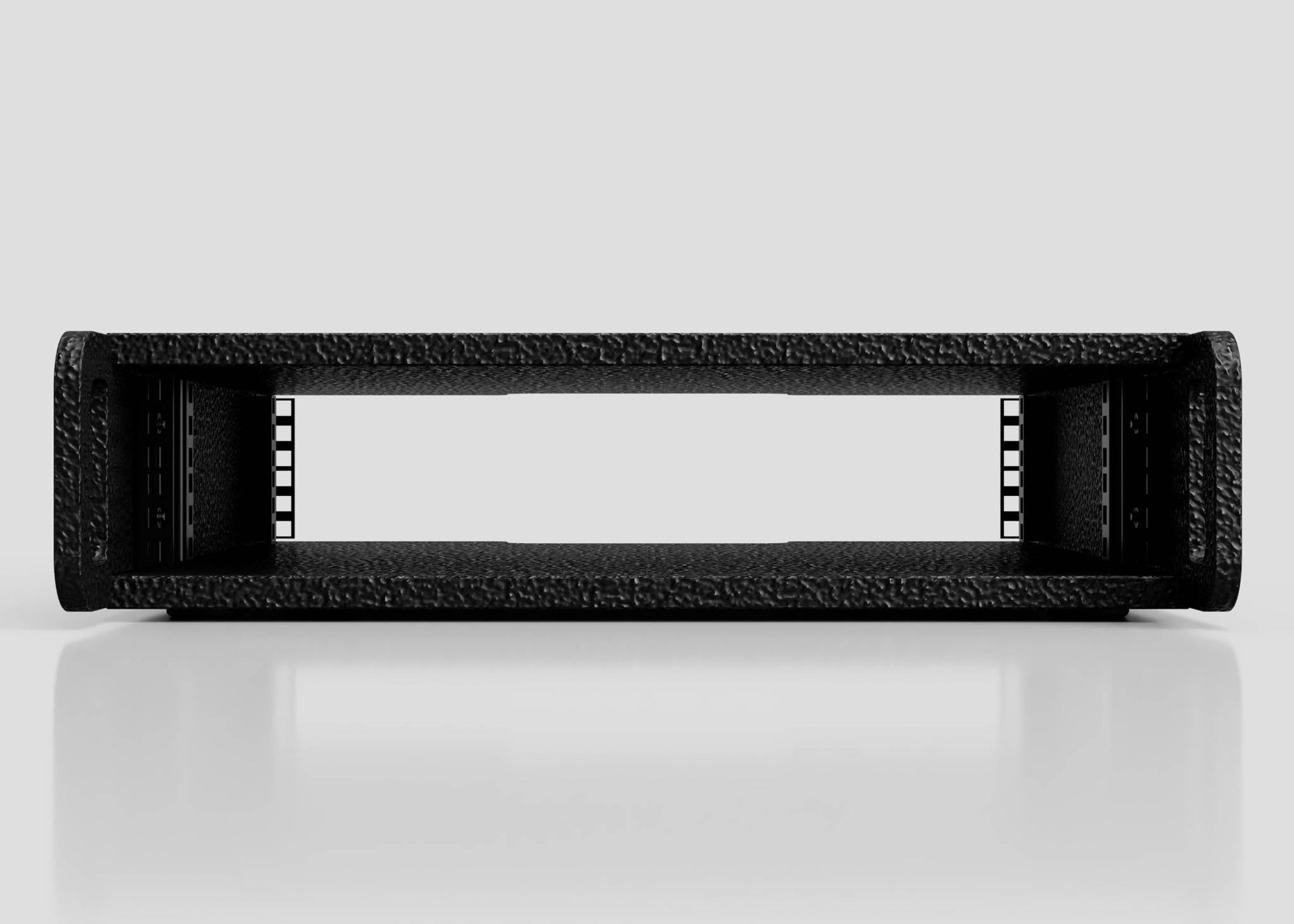 Front view of the 2U Standard Rack Sleeve, an empty black metal rackmount case with a textured finish and open center, shown on a reflective white surface. External dimensions: 514 x 545 x 123 mm.