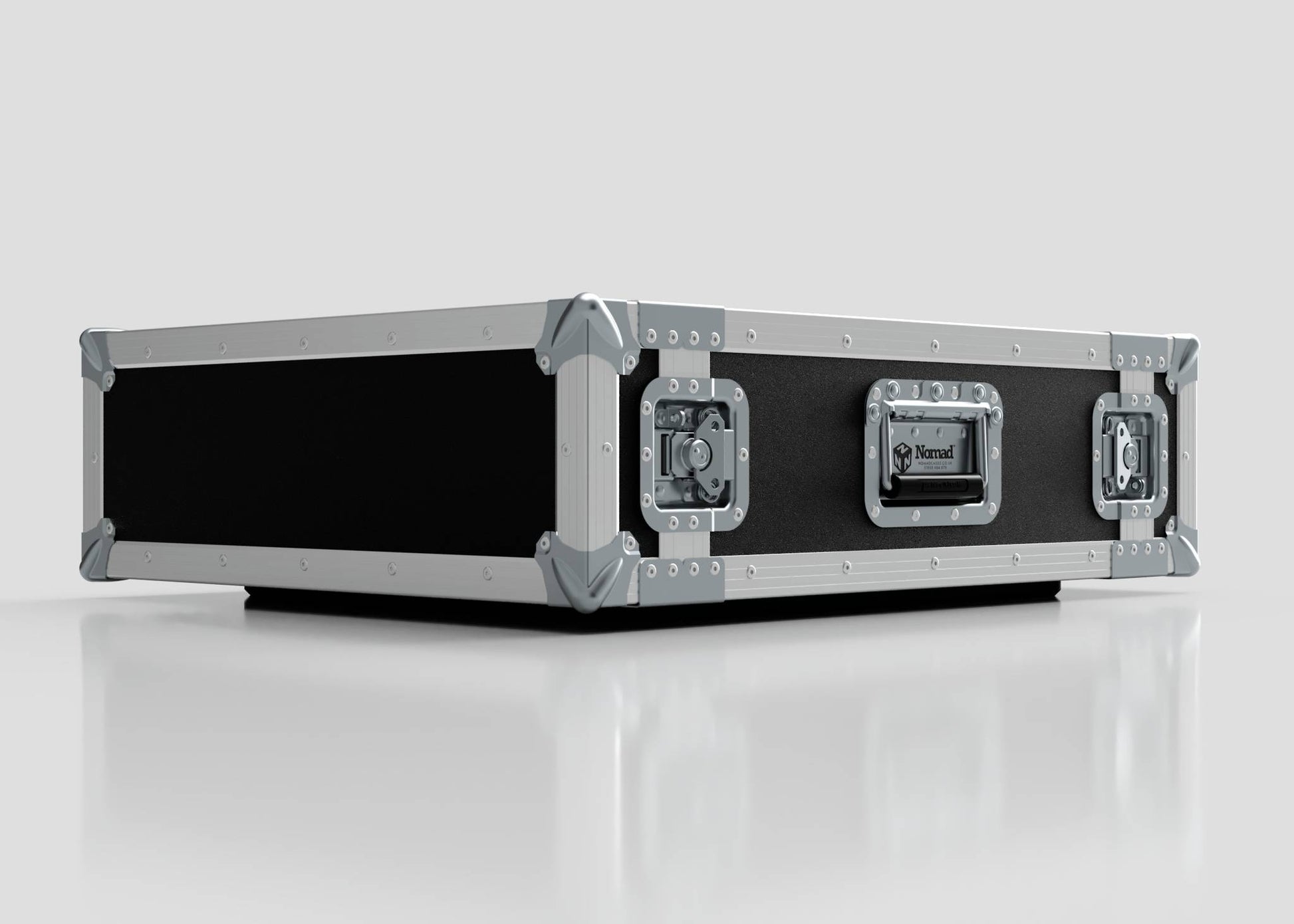 The 3U Foam Shock Mounted 19" Rack Case, featuring black and silver finish, reinforced metal corners and edges, heavy-duty latches, a side handle, and a foam mount rack, sits on a reflective white surface.