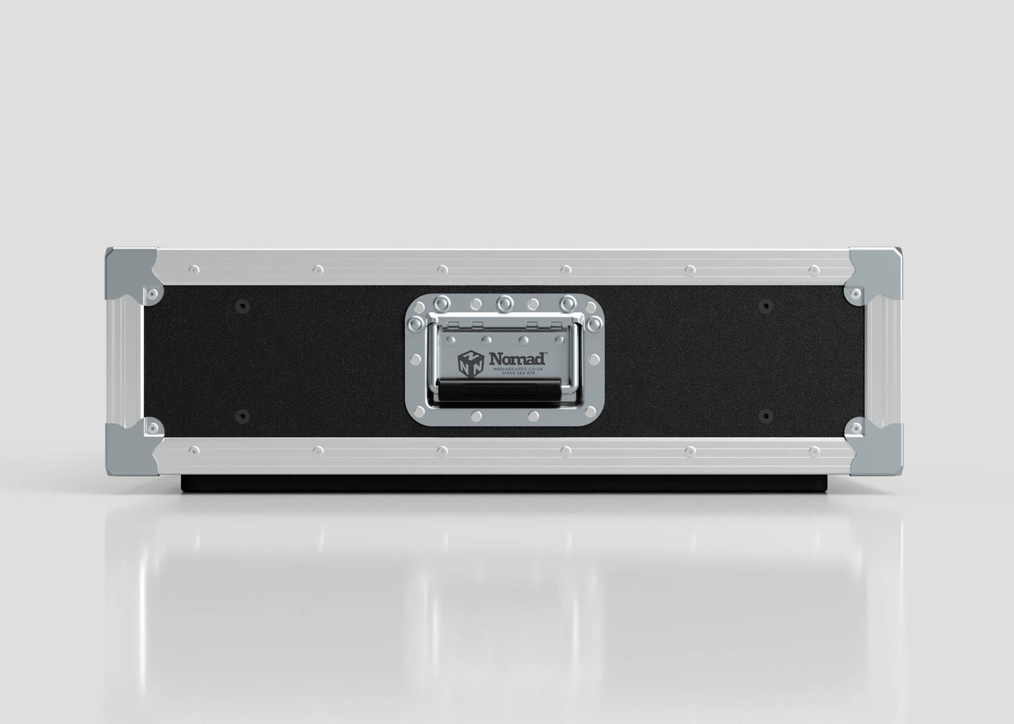 The 3U Slam Rack Case is a black and silver hard case with reinforced metal corners and a central handle featuring the Nomad logo, set on a reflective white surface; its external dimensions are 643 x 561 x 204 mm.