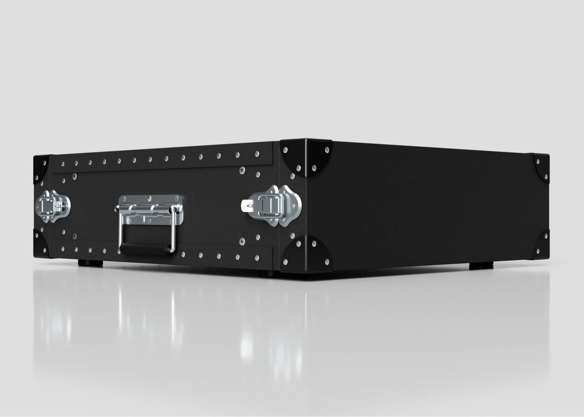 The 3U Standard Poly Rack Case features a black hard-shell design with metal corner reinforcements, padlockable latches, and a handle—perfect for secure, lightweight transport—shown on a reflective white surface against a plain background.