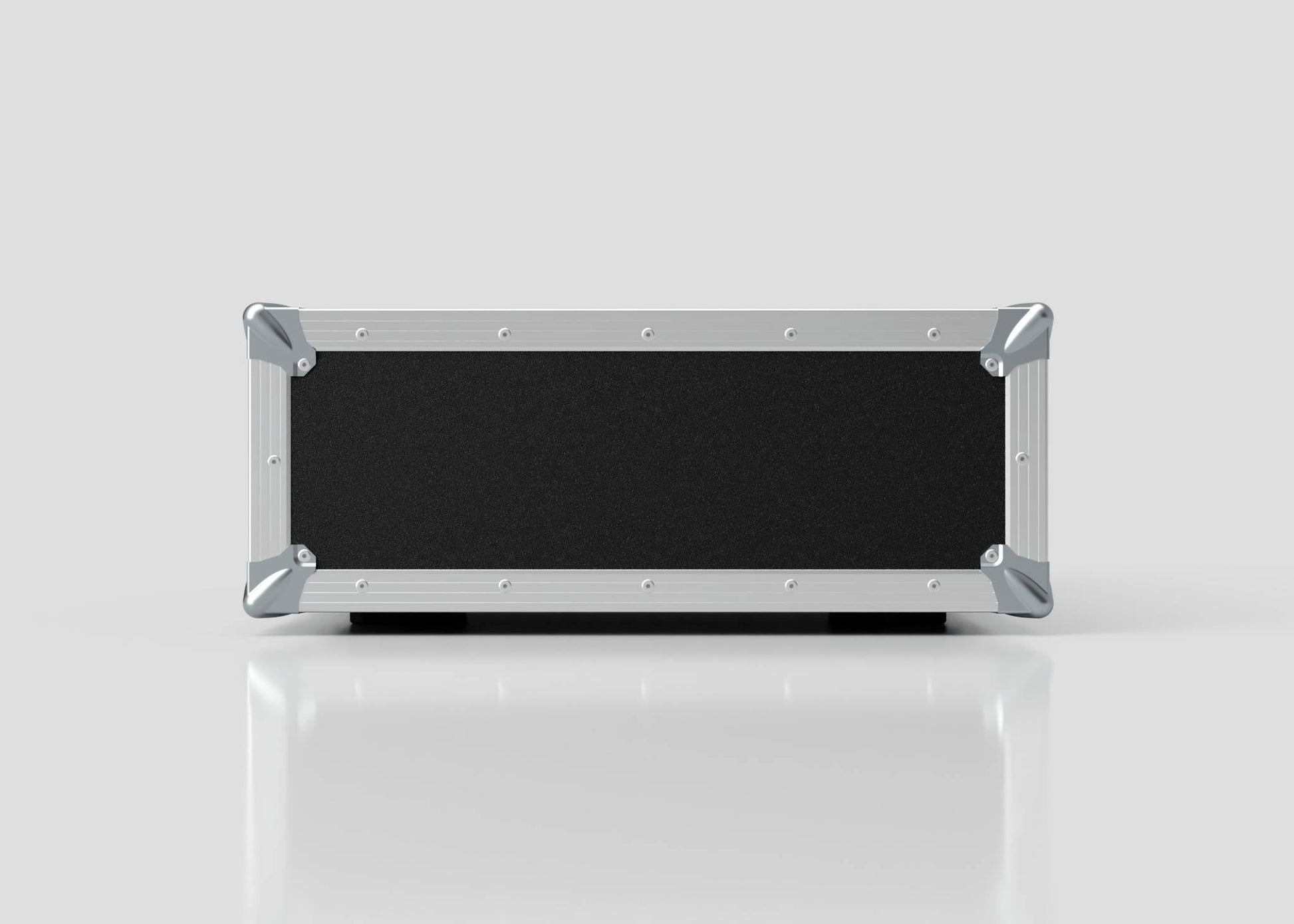 The 3U Suspended Shock Mounted Rack Case, featuring a black and silver rectangular design with metal reinforcements, is displayed on a reflective white surface against a plain background.
