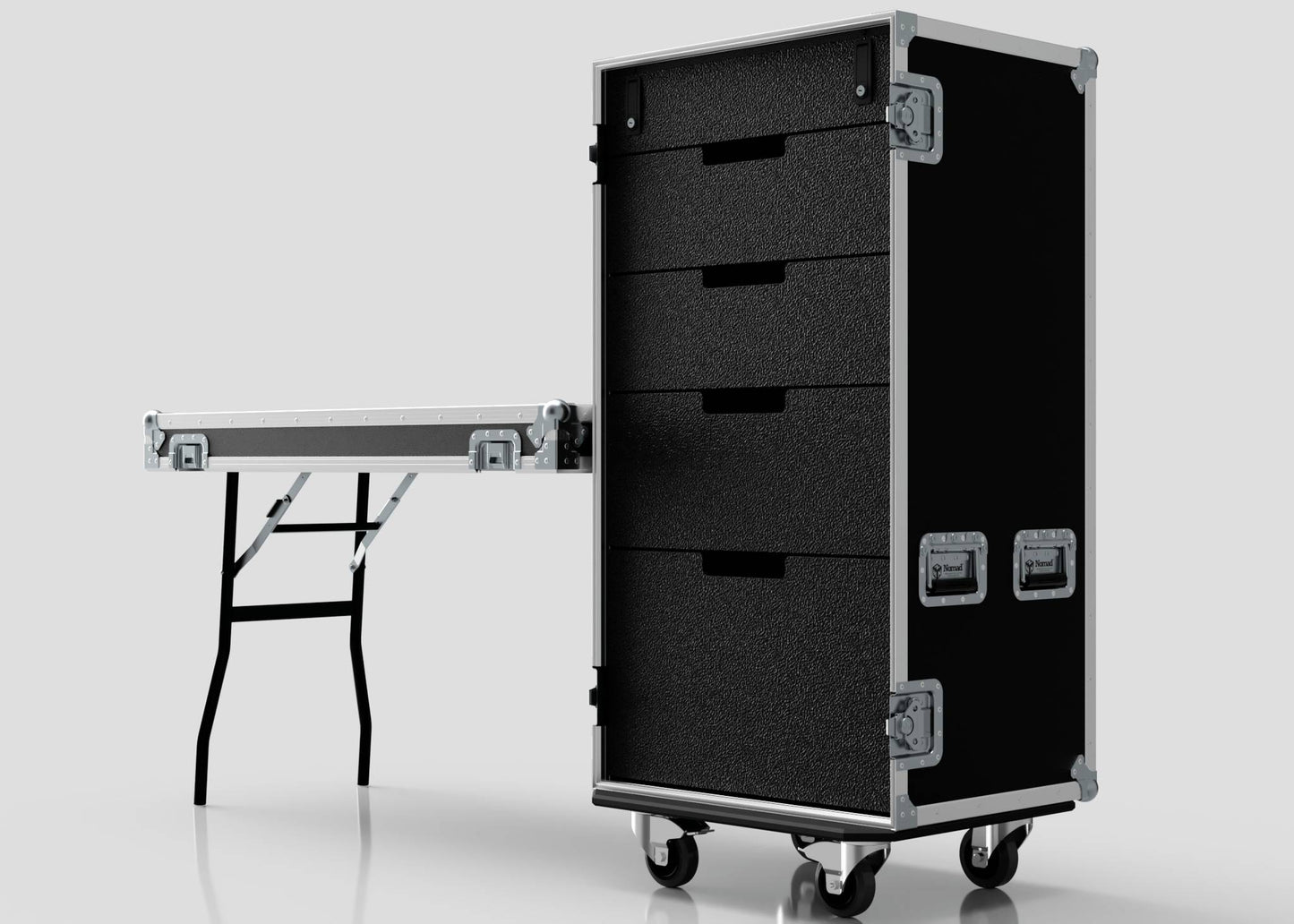 A 5 Drawer Production Case in black, featuring silver hardware and measuring 644x616x1325mm, stands beside an external trestle table with metal legs against a plain background.