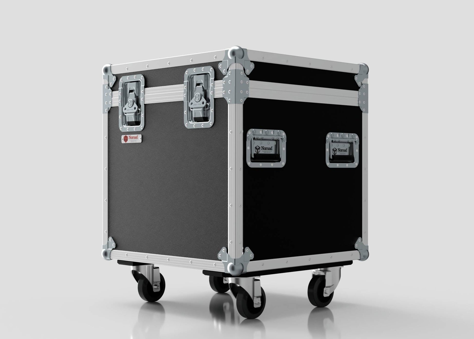 The 600mm Trunk Case features a black and silver finish with metal reinforcements, handles, and four caster wheels. It sits against a plain light background. External dimensions: 625 x 607 x 765 mm.