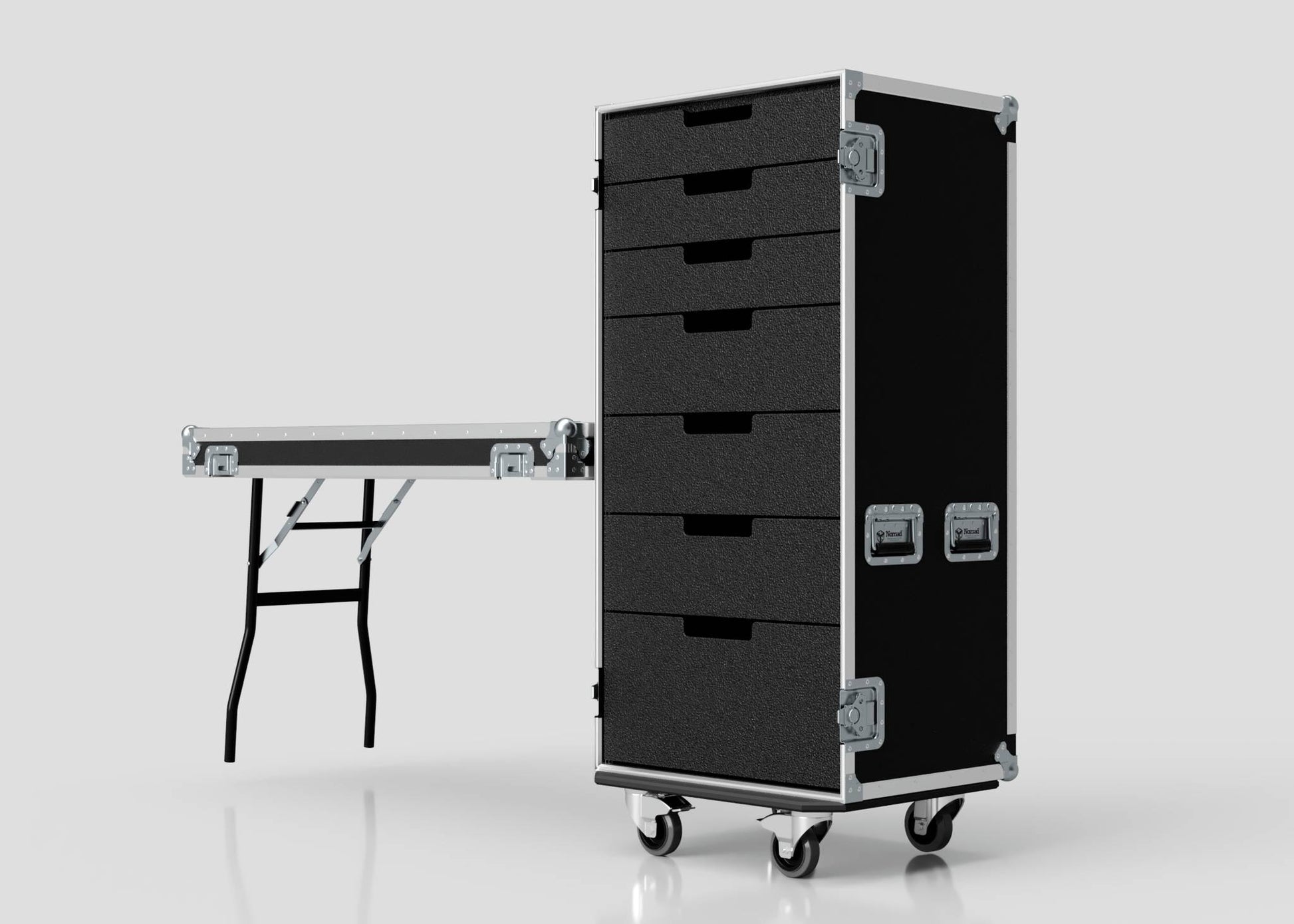 A black 7 Drawer Production Case with metal handles, a rolling design, and a side-attaching trestle table with sturdy metal legs, shown against a plain light background.