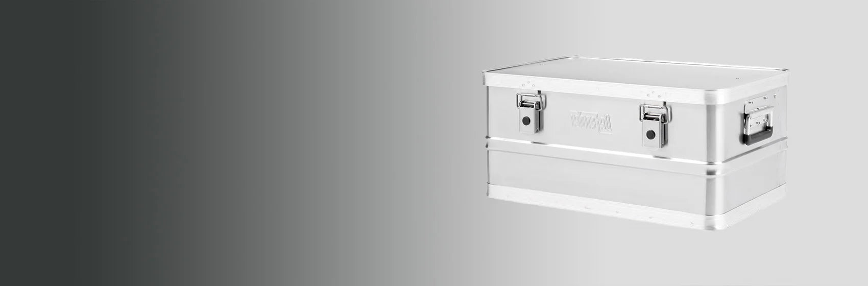 A large silver metal storage box with handles and latches is shown on a gradient gray background.