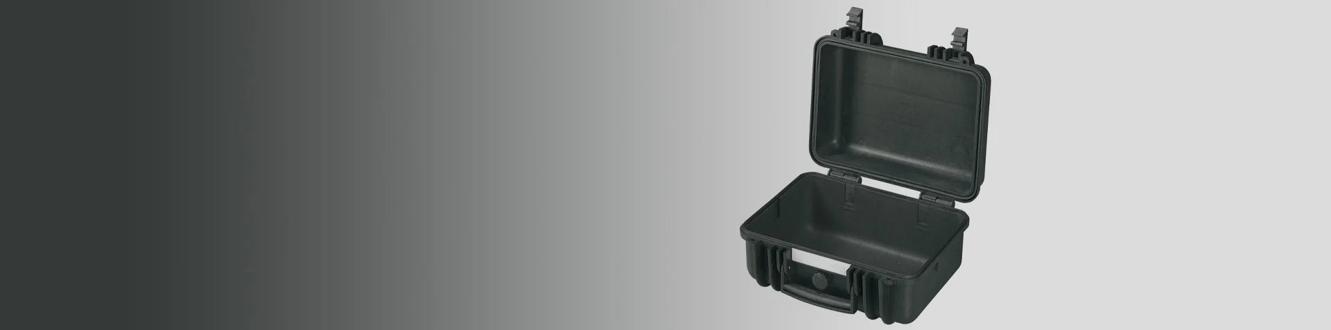 A black hard-shell carrying case is open and empty, displayed against a gray gradient background.