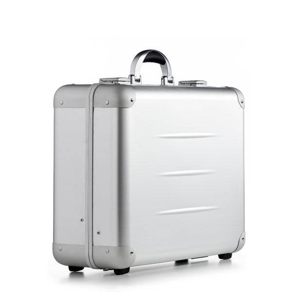 The ALUpur 98400, featuring a silver anodised aluminium case with rounded corners, a top handle, and horizontal side ridges, is displayed against a plain white background.