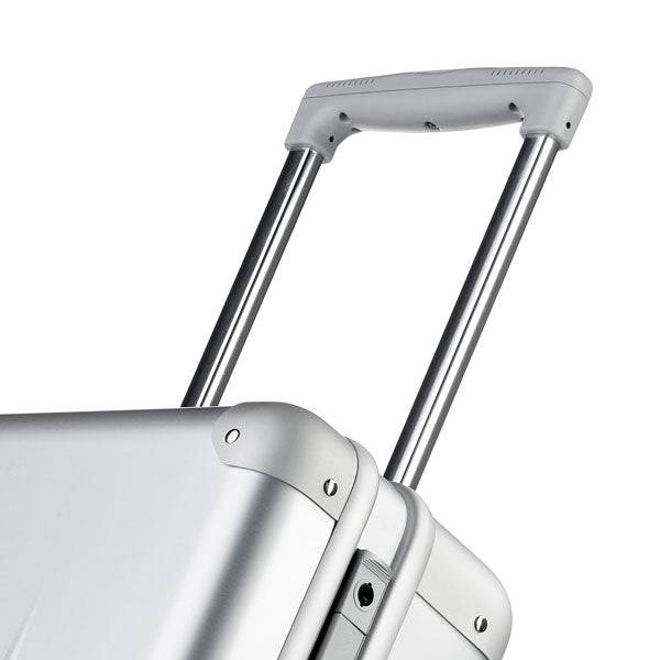 Close-up of the handle and upper corner of the ALUpur 98700N silver aluminium case with an extended telescopic handle, showcasing its durable hard-shell design.