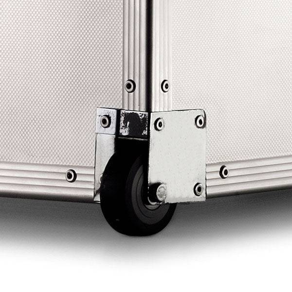 Close-up of the ARK 90900 case corner shows a black caster wheel, silver hardware, and textured white paneling—built with a durable aluminum frame and custom CNC foam for superior protection.