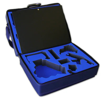 A hard case with custom blue foam inserts, featuring compartments for various tools or equipment, and an open black lid.