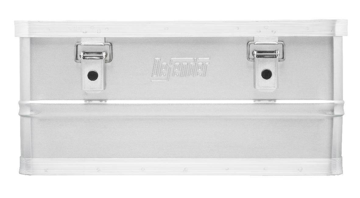 The Defender KA44-017 is a rectangular, silver, stackable storage box with two front latches and an embossed Defender logo on the center front, crafted from lightweight aluminium.