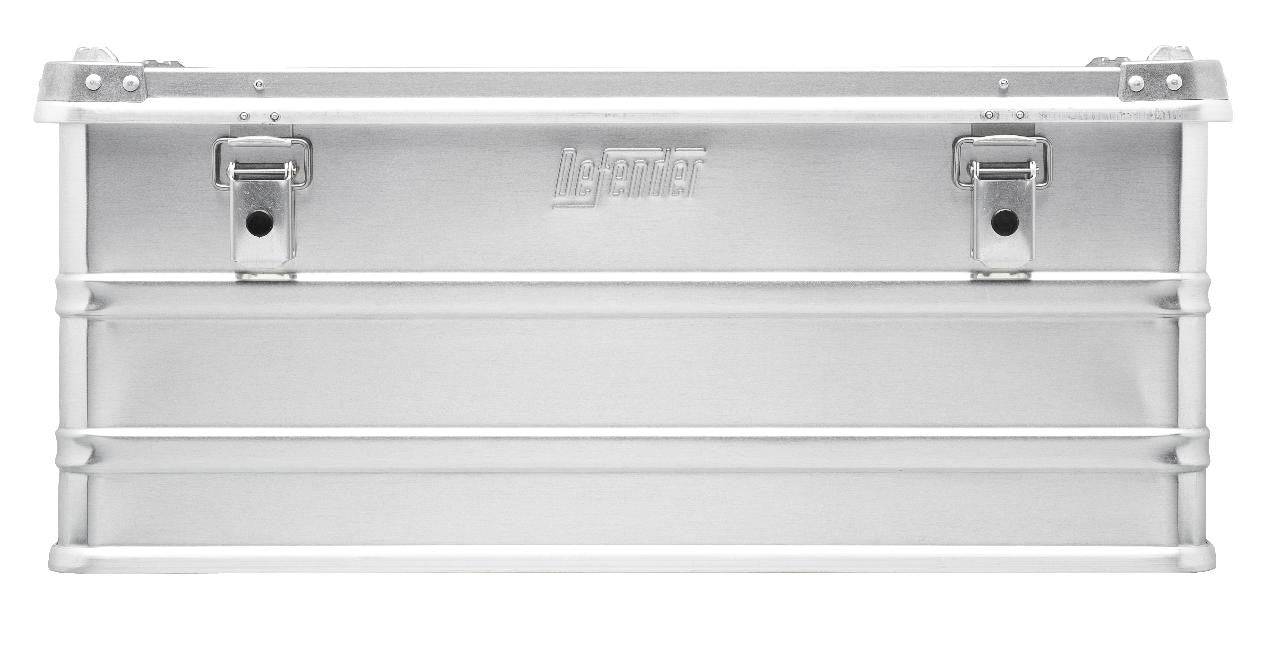 The Defender KA64-009 is a rectangular silver metal storage box featuring front latches, a custom foam interior, and an embossed LaCie logo in the center.