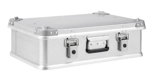 The Defender KA74-002 is a rectangular 29-litre silver metal case with reinforced corners, secure latches, and a black handle. Ideal for screen printing or custom foam interiors. Shown on a white background.