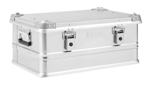 The Defender KA74-003 is a rectangular 42-litre case with reinforced corners, side handles, and front latches, shown against a white background.