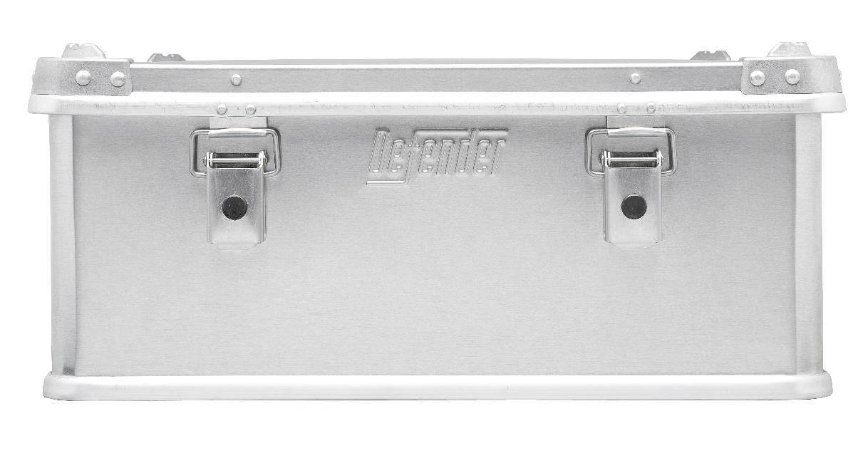 The Defender KA74-006 is a rectangular silver metal storage box with two front latches, "Zarges" embossed at the center, and a custom routed foam interior for secure storage.