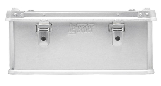 The Defender KA74-006 is a rectangular silver metal storage box with two front latches, "Zarges" embossed at the center, and a custom routed foam interior for secure storage.