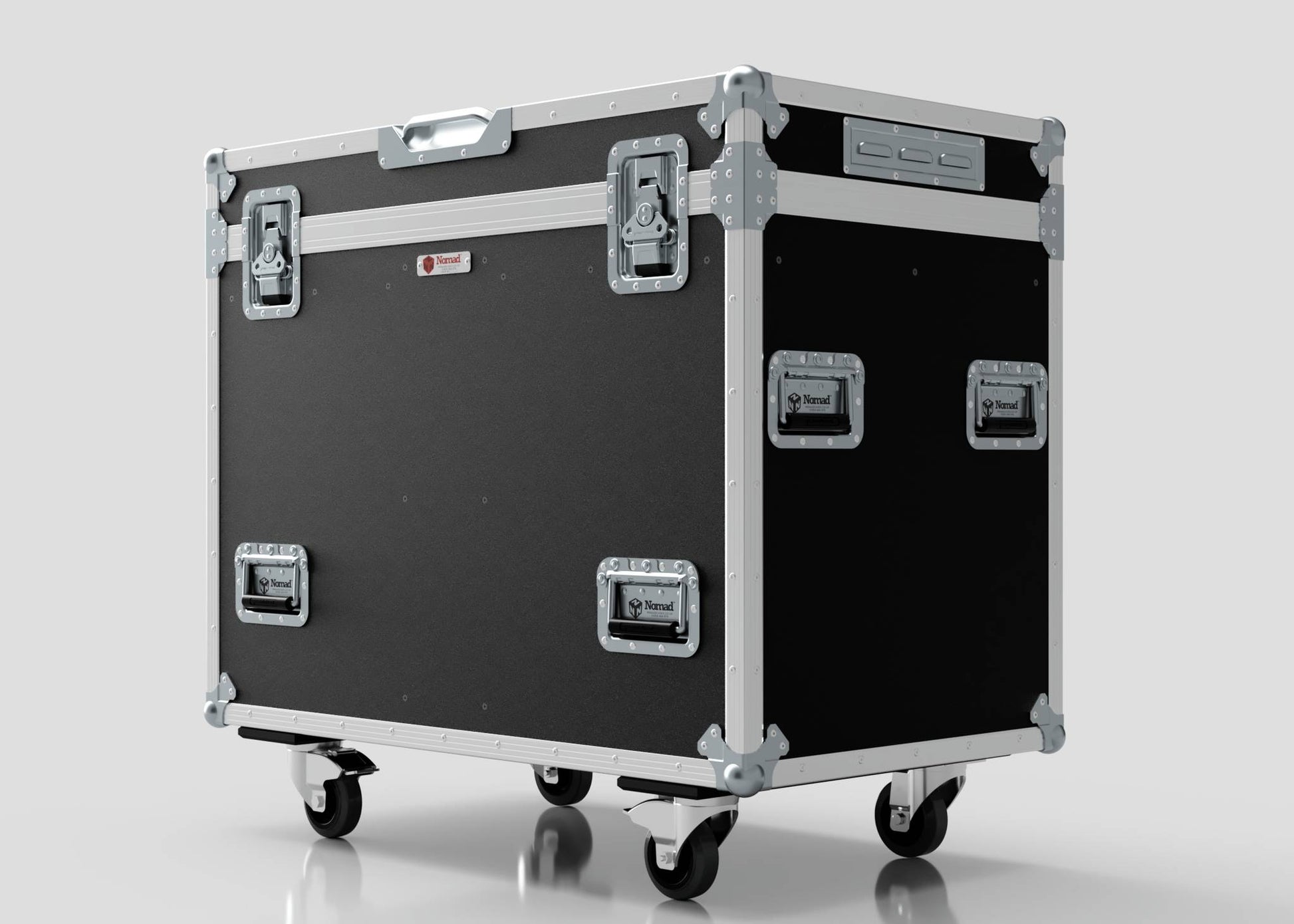 The Dual Prolight Hybrid 300IP is a large black and silver rolling equipment case with metal reinforced corners, handles, and latches; its external dimensions are 1025 x 600 x 930 mm.