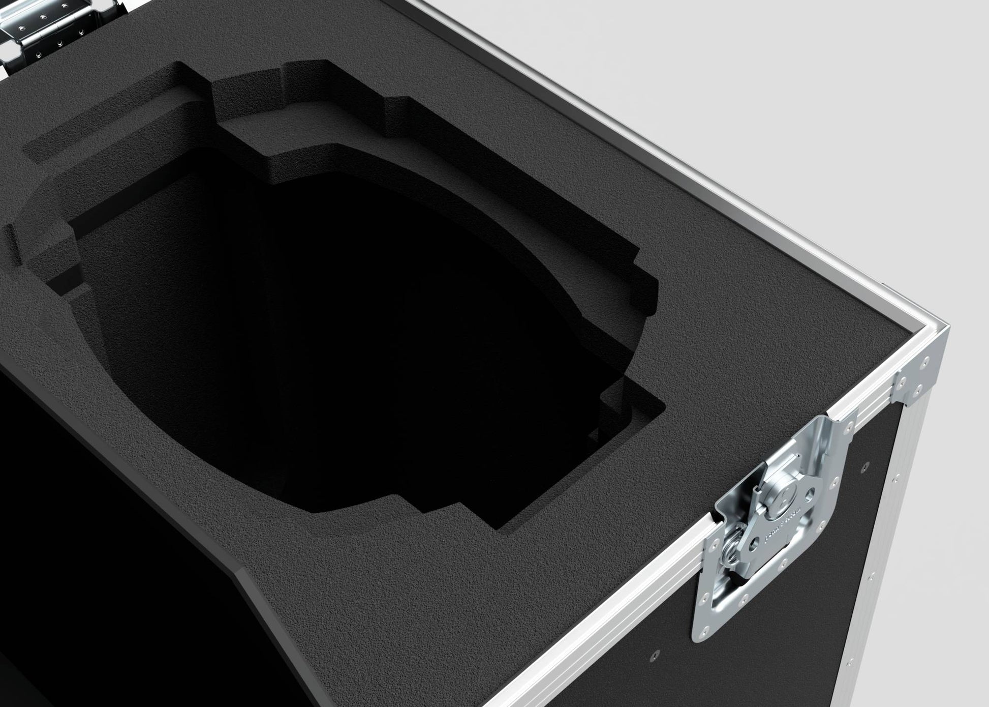 A close-up of a black foam-lined Dual Prolight Hybrid 300IP case with custom cut-out compartment, metal corner latch, and external dimensions of 1025 x 600 x 930 mm.