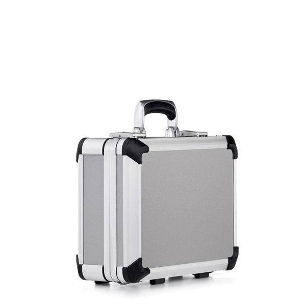 The Exclusive 93400 is a compact silver aluminium frame case with black reinforced corners and an ergonomic handle, shown against a white background.