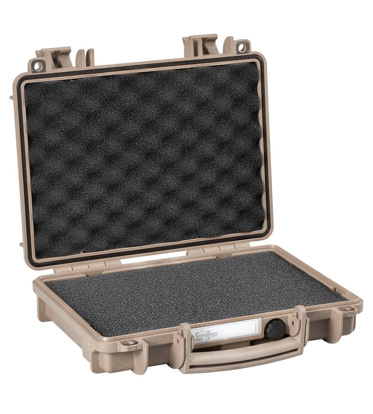 The Explorer 3005 is a tan hard-shell case with a handle, watertight protection, and a manual pressure release valve. Open, it reveals egg-crate foam on the lid and flat foam padding on the bottom.