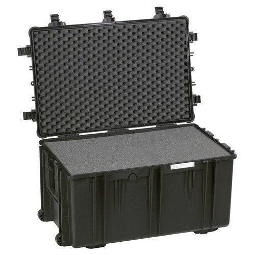 The Explorer 7641 is a large black hard-shell corrosion-proof case with an open hinged lid, interior foam padding for secure storage and transport, a waterproof label, and stainless steel reinforced corners for extra durability.