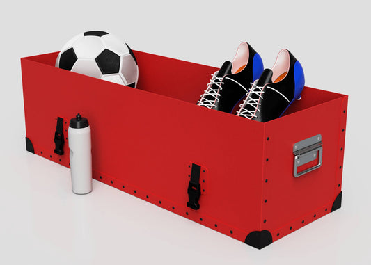 A red Football Storage Poly Case (Small) with a zinc drop handle holds a soccer ball and cleats; a water bottle sits outside next to the case.