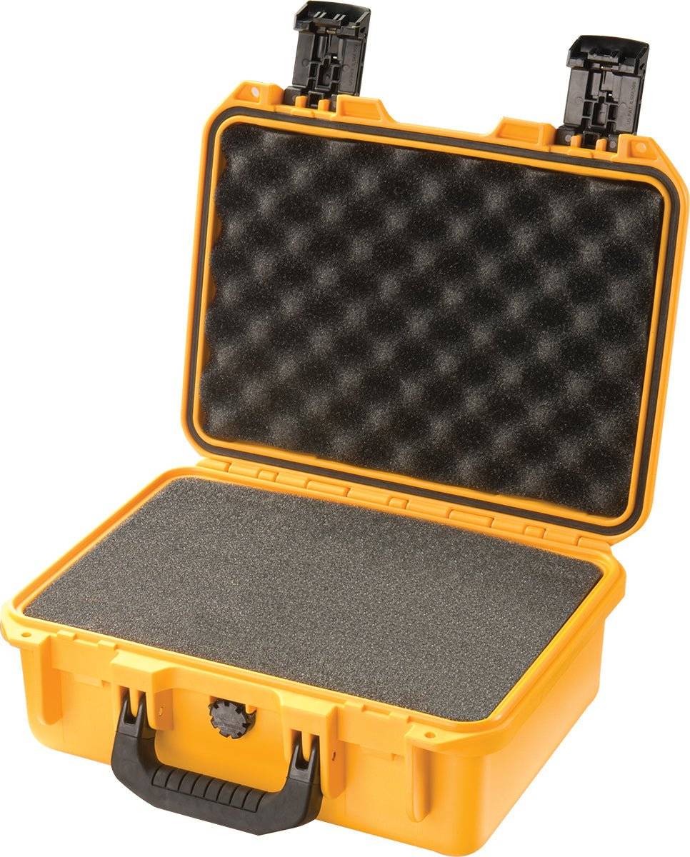 A yellow iM2100 Storm Case with a handle, shown open. Its interior features textured black foam for protection, making this crushproof case ideal for safely transporting valuable items.