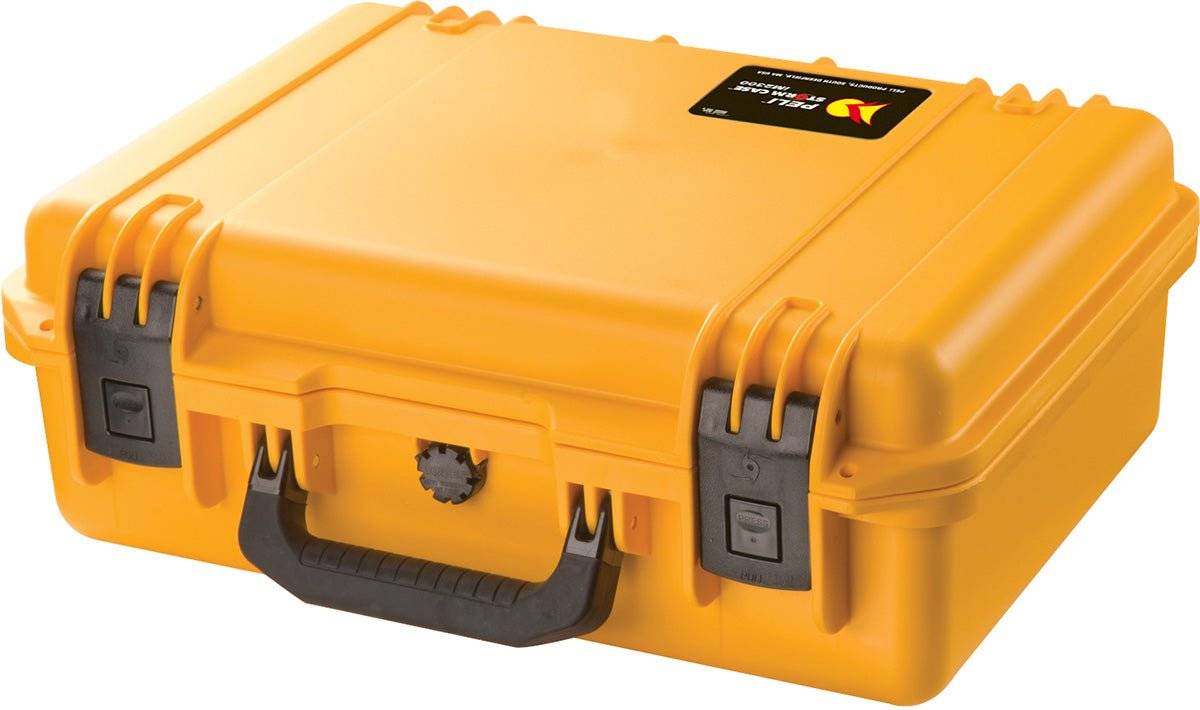The iM2300 Storm Case is a closed, hard-shell yellow PELI case with black latches, a black handle, and a top-right label, designed to be watertight for ultimate protection.