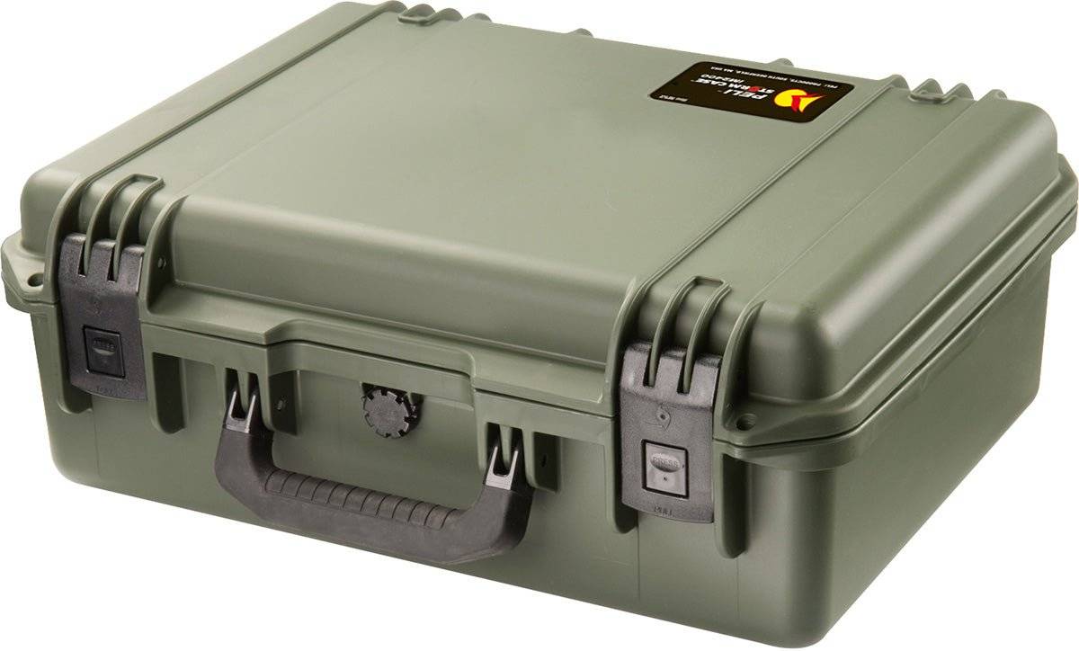 A closed, hard-shell olive green iM2400 Storm Laptop Case with black latches, a handle, and a small rectangular label on the lid—a crushproof case designed for maximum protection.