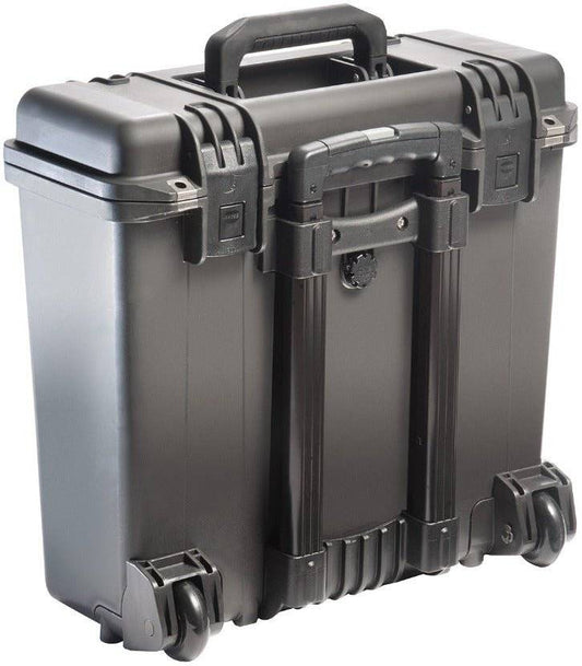 The iM2435 Storm Top Loader Case is a black hard-shell rolling case with handle and latches, designed to be crushproof and watertight for protective transport of equipment.