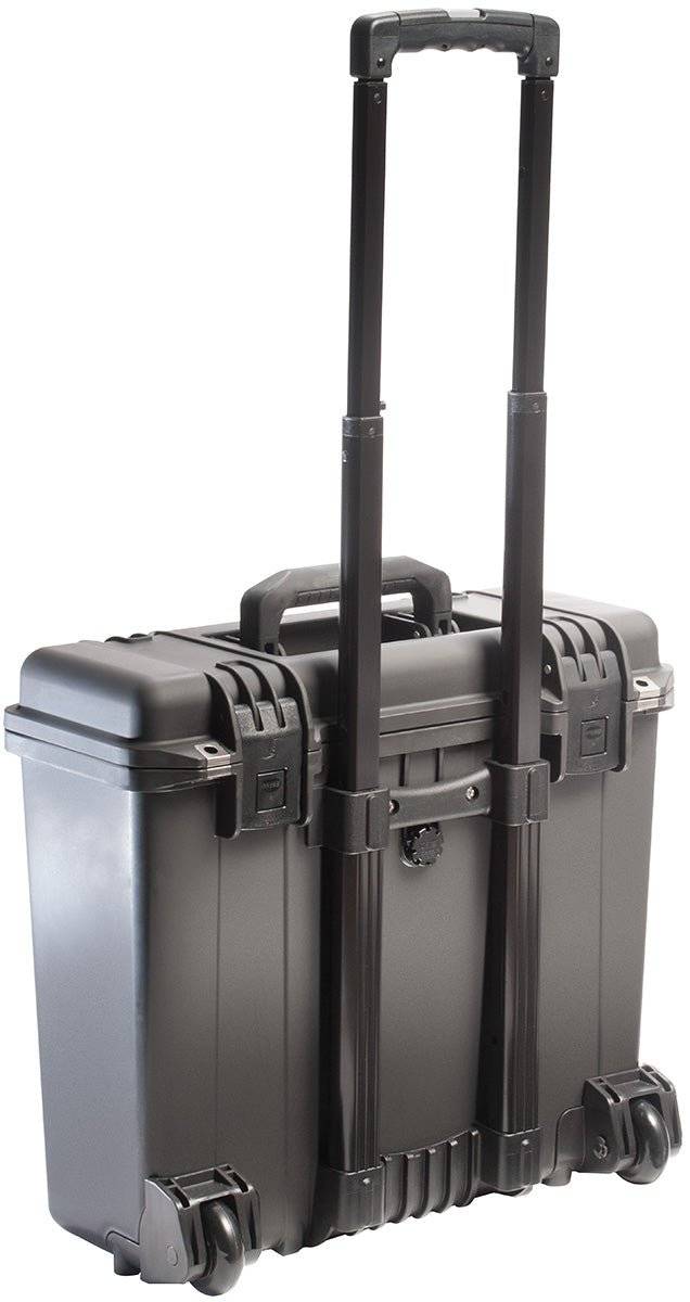 The iM2435 Storm Top Loader Case is a crushproof black hard-shell rolling suitcase with a retractable handle and two wheels, shown from the back.